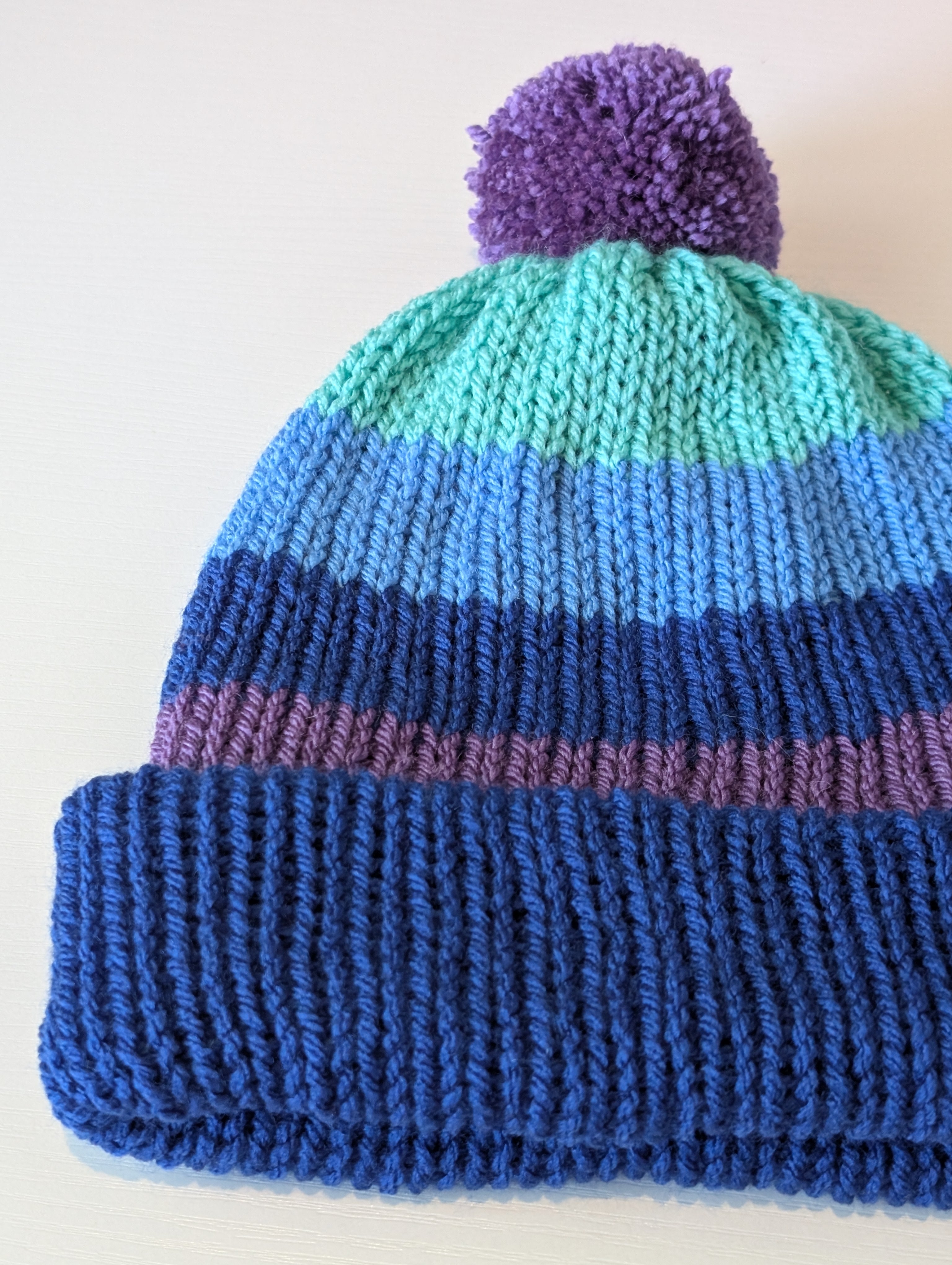 Blue & Purple Striped Knitted Beanie with Pom Pom | Cosy Winter Hat