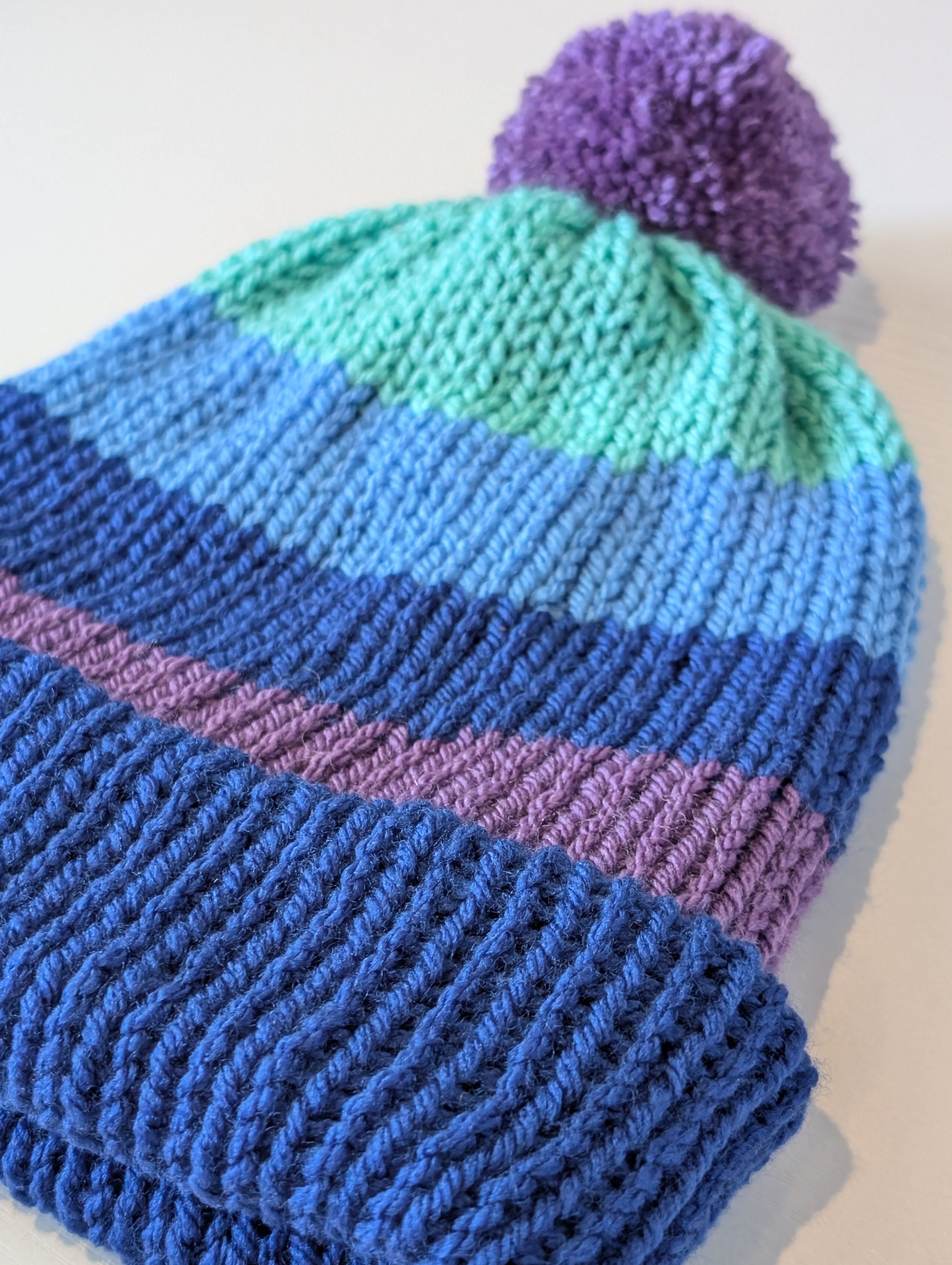 Blue & Purple Striped Knitted Beanie with Pom Pom | Cosy Winter Hat